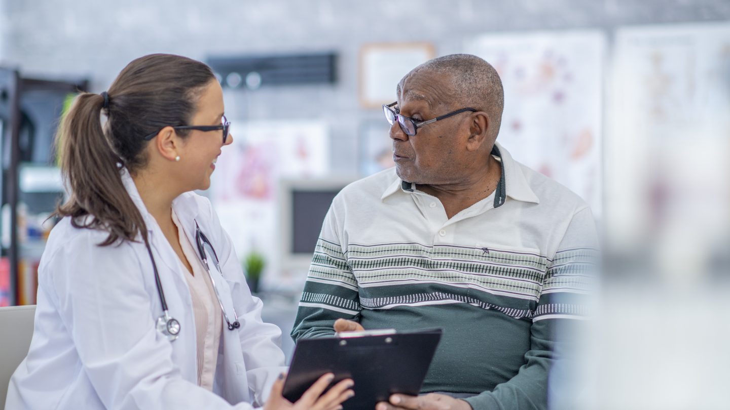 Man talking advice from a doctor.